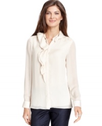 Jones New York's breezy ruffled blouse is an easy staple that goes with everything from jeans to skirts. Jones New York's breezy ruffled blouse is an easy staple that goes with everything from jeans to skirts.