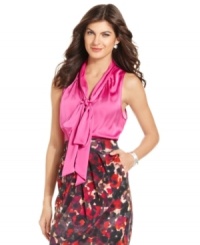 A satiny texture and ties that can be knotted into a charming bow prettify Jones New York's petite blouse. Tuck it into a slim skirt or wear with fitted pants for a luxe look. A satiny texture and ties that can be knotted into a charming bow prettify Jones New York's petite blouse. Tuck it into a slim skirt or wear with fitted pants for a luxe look.