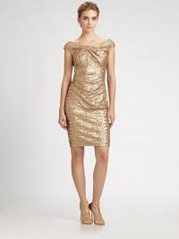 Sparkling metallic sequins and a twisted neckline define this party-perfect style.Twist-front necklineCap sleevesAllover sequinsConcealed back zipFully linedAbout 21 from natural waistPolyesterDry cleanMade in USA of imported fabricModel shown is 5'10 (177cm) wearing US size 4. Sparkling metallic sequins and a twisted neckline define this party-perfect style.Twist-front necklineCap sleevesAllover sequinsConcealed back zipFully linedAbout 21 from natural waistPolyesterDry cleanMade in USA of imported fabricModel shown is 5'10 (177cm) wearing US size 4.