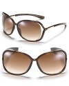 Hit the beach or lounge poolside in Tom Ford's chic oversized sunglasses with open temples.