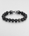 From the Spirited Bead Collection, this two-row beaded bracelet is handsomely crafted from 10mm black onyx beads, featuring a pave black diamond station and a sterling silver lobster clasp.Sterling silverBlack onyx/diamondAbout 9 longAbout 3 diam.Lobster claspImported