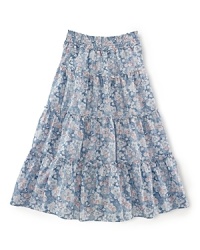 Dainty florals and a smocked waistband give this airy woven cotton maxi skirt a dose of cool boho style. Dainty florals and a smocked waistband give this airy woven cotton maxi skirt a dose of cool boho style.