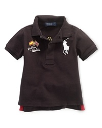 A preppy short-sleeved polo shirt in breathable cotton mesh is accented with country embroidery, celebrating Team USA's participation in the 2012 Olympics. A preppy short-sleeved polo shirt in breathable cotton mesh is accented with country embroidery, celebrating Team USA's participation in the 2012 Olympics.