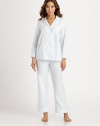 Subtle touches of tone-on-tone embroidery add a feminine edge to these classic pajamas, tailored in the softest brushed cotton flannel.Notched collarButton frontChest pocketLong sleevesEmbroidered details on cuffs and pocketElastic waist pantsInseam, about 29CottonMachine washImported