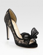 Intricately crafted, semi-sheer lace silhouette with a skinny heel, peep toe and divine bow adornment. Self-covered heel, 4 (100mm)Semi-sheer lace upperLeather lining and solePadded insoleMade in Italy