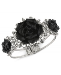 Black and beautiful. This bangle bracelet from 2028, crafted from silver-tone mixed metal, features glass stones and jet-colored flower details for a stunning effect. Approximate diameter: 6-1/2 inches. Black and beautiful. This bangle bracelet from 2028, crafted from silver-tone mixed metal, features glass stones and jet-colored flower details for a stunning effect. Approximate diameter: 6-1/2 inches.