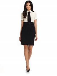 THE LOOKTwo-piece lookSilk crepe de chine topWool gabardine high-waisted skirt with self beltPoint collar with single buttonAttached tieShort cuffed sleevesHidden back zipperStraight skirtSide seam pocketsTHE FITAbout 36½ from shoulder to hemTHE MATERIALSilk top; wool skirtFully linedCARE & ORIGINDry cleanMade in Italy THE LOOKTwo-piece lookSilk crepe de chine topWool gabardine high-waisted skirt with self beltPoint collar with single buttonAttached tieShort cuffed sleevesHidden back zipperStraight skirtSide seam pocketsTHE FITAbout 36½ from shoulder to hemTHE MATERIALSilk top; wool skirtFully linedCARE & ORIGINDry cleanMade in Italy