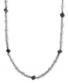 Subtle cube accents in hematite hues set the state for this illusion necklace from BCBGeneration. Crafted in silver tone mixed metal. Approximate length: 32 inches.