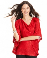 Chic sequins add sparkle to Alfani's poncho-style sweater. Dress it up with skinny trousers or keep it casual with jeans. Chic sequins add sparkle to Alfani's poncho-style sweater. Dress it up with skinny trousers or keep it casual with jeans.