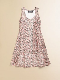 Blooming with a brilliant floral print, this lightweight racerback frock is ready for warm weather.ScoopneckSleevelessPullover racerbackTiered hemFully linedPolyesterHand washMade in USA of imported fabric Blooming with a brilliant floral print, this lightweight racerback frock is ready for warm weather.ScoopneckSleevelessPullover racerbackTiered hemFully linedPolyesterHand washMade in USA of imported fabric