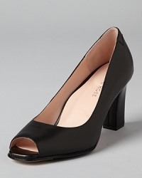 Orthopedic surgeon-turned-shoe designer Taryn Rose combines comfort and class in these elegant, versatile peep toe pumps. Orthopedic surgeon-turned-shoe designer Taryn Rose combines comfort and class in these elegant, versatile peep toe pumps.