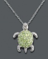 Wade into stylish waters by adding an adorable Victoria Townsend turtle pendant. Crafted in sterling silver, this necklace glistens with the addition of round-cut peridots (7/8 ct. t.w.) and diamond accents. Approximate length: 18 inches. Approximate drop: 3/4 inch.
