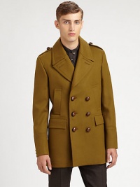 Fine Italian craftsmanship is represented in this outerwear classic, tailored in a superior wool blend with heritage-inspired details, finished in a streamlined, double-breasted silhouette.Button-frontNotch lapelShoulder epaulettesSide slash, waist flap pocketsRear beltFully linedAbout 33 from shoulder to hem80% virgin wool/20% polyamideDry cleanMade in Italy