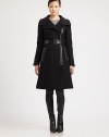Perennially edgy exposed zippers trimmed in leather add a stylish dimension to this wool-cashmere coat. It offers a touch of stretch for an impeccable fit.Button details at stand collarSeam detailsAsymmetrical zipper closureLeather beltSlash pocketsFully linedAbout 38 from shoulder to hemWool/polyamide/cashmereDry clean by leather specialistImportedModel shown is 5'9 (175cm) wearing US size Small. 