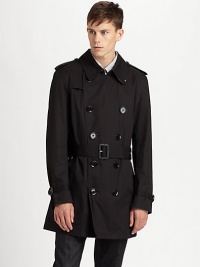An iconic Burberry Brit style featuring a button front, convenient front pockets and a back vent.Collar neckButton-tab on long sleevesButtoned flap pocketsBack ventFully linedAbout 36 from shoulder to hemPolyesterMachine washImported An iconic Burberry Brit style featuring a button front, convenient front pockets and a back vent.Collar neckButton-tab on long sleevesButtoned flap pocketsBack ventFully linedAbout 36 from shoulder to hemPolyesterMachine washImported