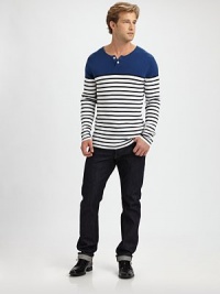 An ideal layering option season after season, shaped in a fine, soft cotton knit.Two-button placketCottonDry cleanImported