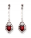 Timeless and romantic, Swarovski's silver tone mixed metal pierced earrings add feminine elegance to any outfit. The Siam crystal hearts and clear crystal pavé sparkle in classic, festive colors. Approximate drop: 1-7/8 inches.