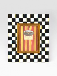 Display your treasured moments in this opulent, hand-painted frame with gilt inner molding.Hand-painted checks on enameled steelGlassAccommodates a 5 X 7 photographOverall, 11 X 13Linen-covered easel and backImported Display your treasured moments in this opulent, hand-painted frame with gilt inner molding.Hand-painted checks on enameled steelGlassAccommodates a 5 X 7 photographOverall, 11 X 13Linen-covered easel and backImported
