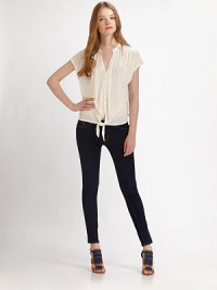 A self-tied knot at the hemline is a beautiful vintage-inspired addition to this lightweight top. Slit v-neckDropped shouldersShort cap sleevesButton-down frontSelf-tie at hemAbout 23 from shoulder to hemViscoseMachine washImportedModel shown is 5'10 (177cm) wearing US size Small. A self-tied knot at the hemline is a beautiful vintage-inspired addition to this lightweight top. Slit v-neckDropped shouldersShort cap sleevesButton-down frontSelf-tie at hemAbout 23 from shoulder to hemViscoseMachine washImportedModel shown is 5'10 (177cm) wearing US size Small.