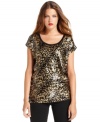 MICHAEL Michael Kors delivers a double dose of shine with this top, featuring a metallic animal print and sequins throughout.