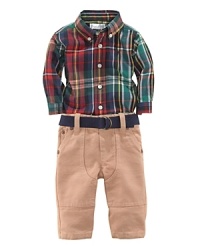 A preppy woven twill pant is paired with a plaid button-down crafted from soft cotton for a timeless heritage look. A preppy woven twill pant is paired with a plaid button-down crafted from soft cotton for a timeless heritage look.