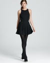 Enlivened with tonal polka dots, this fabulous little black DV Dolce Vita dress flounces into fall with party-perfect style.