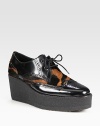 Classic leather oxford style heightened with a platform and exotic-printed calf hair. Rubber wedge, 2¾ (70mm)Rubber platform, 1¼ (30mm)Compares to a 1½ heel (40mm)Leather and calf hair upperLeather liningRubber solePadded insoleMade in Italy