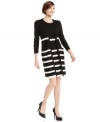 Calvin Klein's sweater dress and matching cardigan make a chic office ensemble with a striped pattern and sleek fit. Easy to accessorize with neutral tones or make a bit bolder with bright shoes!