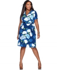 Revitalize your work wardrobe with Charter Club's short sleeve plus size dress, featuring a floral print and faux wrap design. (Clearance) Revitalize your work wardrobe with Charter Club's short sleeve plus size dress, featuring a floral print and faux wrap design. (Clearance)