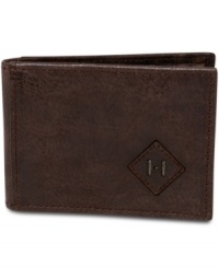 Look like the well-traveled man you are-or want to be-with this distressed leather wallet from Tommy Hilfiger.