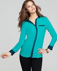 Cool yet sophisticated, this tailored Free People top is destined to be a future wardrobe classic. Cool yet sophisticated, this tailored Free People top is destined to be a future wardrobe classic.