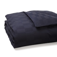 A classic check pattern in cotton jacquard infuses this luxe HUGO BOSS duvet cover with textural richness. The dramatic navy hue dazzles against white sheets and accent pillows. A classic check pattern in cotton jacquard infuses this luxe HUGO BOSS duvet cover with textural richness. The dramatic navy hue dazzles against white sheets and accent pillows.