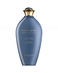 It is the moment where it all begins. Shalimar Parfum Initial, the new Guerlain fragrance, is an initiation to sensuality. Discover this luminous Amber-Floral fragrance. The fresh burst of bergamot gives way to a delicate floral heart: an orchestrated overdose of rose, jasmine and iris. The vanilla & Tonka bean base instantly creates addiction, like the captivating feel of cashmere on bare skin. It is the moment where it all begins. Shalimar Parfum Initial, the new Guerlain fragrance, is an initiation to sensuality. Discover this luminous Amber-Floral fragrance. The fresh burst of bergamot gives way to a delicate floral heart: an orchestrated overdose of rose, jasmine and iris. The vanilla & Tonka bean base instantly creates addiction, like the captivating feel of cashmere on bare skin.