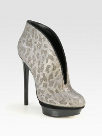 A subtle leopard print adds flair to this glittery suede-trimmed ankle boot, with a patent leather platform and heel. Patent leather heel, 5½ (140mm)Patent leather platform, 1½ (40mm)Compares to a 4 heel (100mm)Glitter-coated fabric upper with suede trimPull-on styleLeather lining and solePadded insoleImportedOUR FIT MODEL RECOMMENDS ordering one half size down as this style runs large. A subtle leopard print adds flair to this glittery suede-trimmed ankle boot, with a patent leather platform and heel. Patent leather heel, 5½ (140mm)Patent leather platform, 1½ (40mm)Compares to a 4 heel (100mm)Glitter-coated fabric upper with suede trimPull-on styleLeather lining and solePadded insoleImportedOUR FIT MODEL RECOMMENDS ordering one half size down as this style runs large.