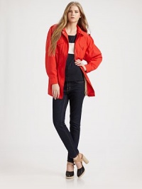 The trenchcoat meets the safari jacket in a versatile, lightweight cotton blend with a modern edge.Shoulder epaulets with buttonsSpread collarLong sleeves with button cuffsFour button-flap front pocketsHidden front zipperDrawstring waistFully linedAbout 30 from shoulder to hem60% cotton/40% nylonDry cleanImportedModel shown is 5'9½ (176cm) wearing US size Small. The trenchcoat meets the safari jacket in a versatile, lightweight cotton blend with a modern edge.Shoulder epaulets with buttonsSpread collarLong sleeves with button cuffsFour button-flap front pocketsHidden front zipperDrawstring waistFully linedAbout 30 from shoulder to hem60% cotton/40% nylonDry cleanImportedModel shown is 5'9½ (176cm) wearing US size Small.
