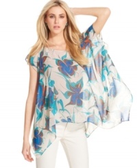 A bold floral print makes this RACHEL Rachel Roy top a stylish pick for a summer look -- perfectly paired with skinny jeans or cutoff shorts! A bold floral print makes this RACHEL Rachel Roy top a stylish pick for a summer look -- perfectly paired with skinny jeans or cutoff shorts!