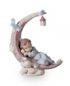 A sleepy little angel snoozes under the stars, in the crook of a crescent moon, in this handcrafted Heavenly Slumber figurine by Lladro. Cute for a child's bedroom.