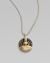 A golden Buddha in repose is surrounded by a field of pavé chocolate diamonds in this gleaming pendant on a delicate ball chain. Chocolate diamonds, 0.11 tcw 14k yellow gold Chain length, about 16 Pendant diameter, about ½ Lobster clasp Imported