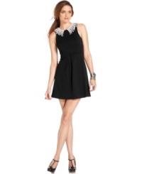 With a lace Peter Pan collar, this Free People dress is almost demure but a back cutout keeps it unexpectedly flirty! With a lace Peter Pan collar, this Free People dress is almost demure but a back cutout keeps it unexpectedly flirty!