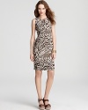 Polished enough for the office yet daring enough for after-dark, embrace your fashion fierceness in this Anne Klein Dress animal-print sheath.