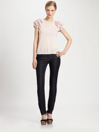 It's the classic tee, re-imagined: this modal design features a timeless crewneck and pretty, ruffle sleeves.CrewneckTulle-ribbon, short sleevesRibbed trimPull-on styleAbout 24 from shoulder to hemModalImported Model shown is 5'10 (177cm) wearing US size Small. It's the classic tee, re-imagined: this modal design features a timeless crewneck and pretty, ruffle sleeves.CrewneckTulle-ribbon, short sleevesRibbed trimPull-on styleAbout 24 from shoulder to hemModalImported Model shown is 5'10 (177cm) wearing US size Small.