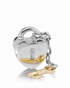 This classic PANDORA charm features a heart-shaped lock and dangling key, adding eye-catching movement to your bracelet.