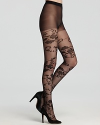 Swirling floral tulle draws attention to your lovely legs. Control top hosiery by DKNY.