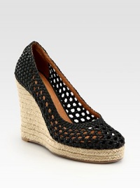 Woven leather upper in a modern mesh-like silhouette, elevated by an espadrille wedge and platform. Braided hemp wedge, 4 (100mm)Braided hemp platform, 1 (25mm)Compares to a 3 heel (75mm)Woven leather upperLeather lining and solePadded insoleImported Woven leather upper in a modern mesh-like silhouette, elevated by an espadrille wedge and platform. Braided hemp wedge, 4 (100mm)Braided hemp platform, 1 (25mm)Compares to a 3 heel (75mm)Woven leather upperLeather lining and solePadded insoleImported