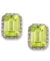 A green sensation. These unique emerald-cut peridot stud earrings (4 ct. t.w.) stand out against a halo of round-cut diamond accents. Set in 10k white gold. Approximate length: 8 mm. Approximate width: 6 mm.