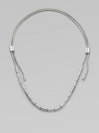 An edgy piece in sleek silvertone with oblong beads on a textured snake chain. Silvertone brassLength, about 37Sliding adjustable slip-on styleImported An edgy piece in sleek silvertone with oblong beads on a textured snake chain. Silvertone brassLength, about 37Sliding adjustable slip-on styleImported