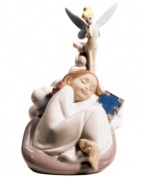 Dream come true. No figment of her imagination, this heartwarming Disney figurine depicts a young child sleeping soundly under Tinker Bell's watchful eye. Handmade in Nao by Lladro porcelain.