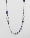 From the Bijoux Collection. A beautiful mix of semi-precious beads and sterling silver clover links on a long box link chain.Blue topaz, gray moonstone, gray cultured pearl, kyanite, lapis, labradorite, hematite and prasioliteSterling silverLength, about 40Toggle closureImported