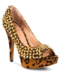 For the fearless diva in all of us. Vince Camuto's Mandie peep-toe platform pumps get dramatic with all-over spiky studs. For the fearless diva in all of us. Vince Camuto's Mandie peep-toe platform pumps get dramatic with all-over spiky studs.