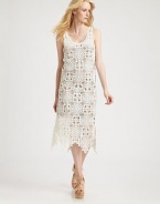 Channel vintage chic in this comely midi-length sheath of beautifully-crocheted lace.ScoopneckSleevelessScalloped lace edge hemSide slitSlip liningAbout 46 from natural waistCottonDry cleanImportedModel shown is 5'10½ (179cm) wearing US size Small.